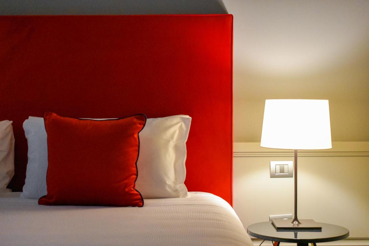 Palazzo Cornalia Hotel Milan Bagian luar foto A room at the hotel