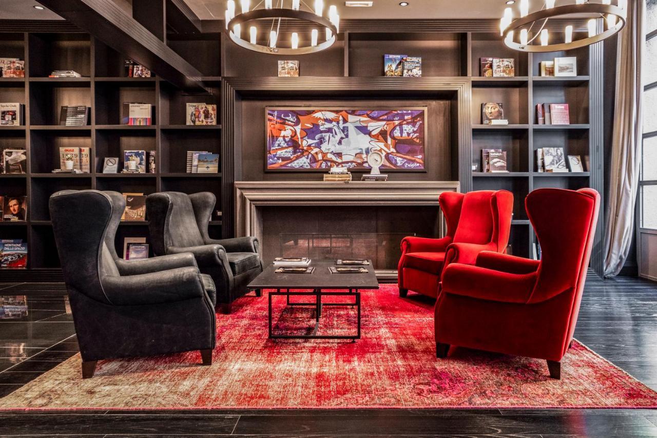 Palazzo Cornalia Hotel Milan Bagian luar foto The lounge at the airport