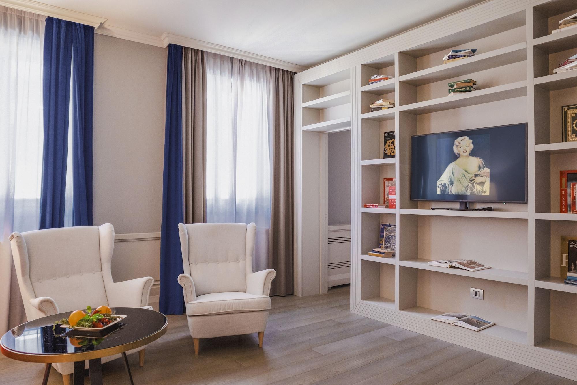 Palazzo Cornalia Hotel Milan Bagian luar foto A room at the residence