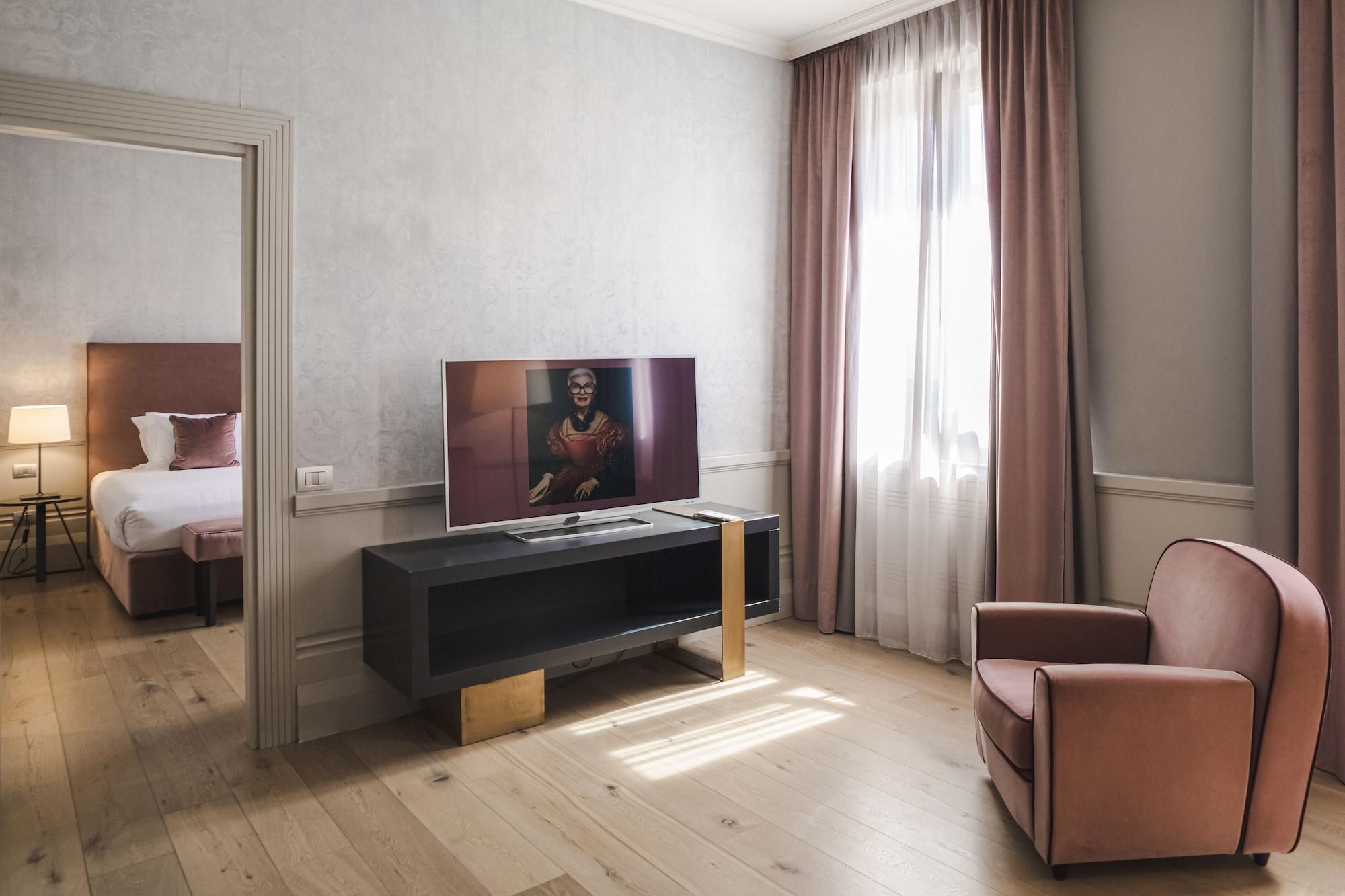 Palazzo Cornalia Hotel Milan Bagian luar foto A suite at the hotel