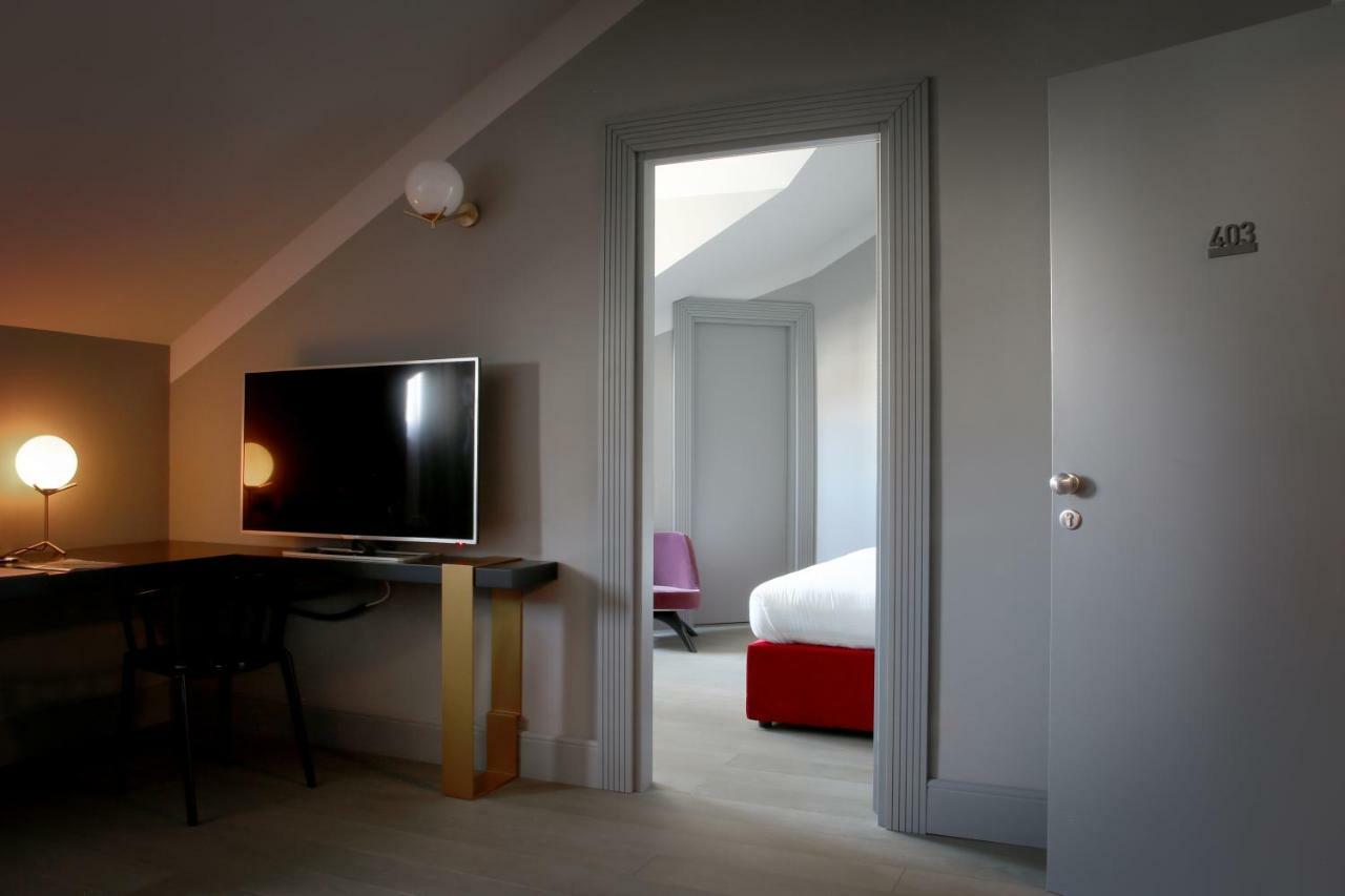 Palazzo Cornalia Hotel Milan Bagian luar foto A room at the hotel